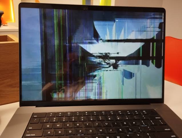 MacBook with damaged display for repair
